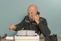 Newspaper editor of the past. Work desk, typewriter and phone Royalty Free Stock Photo