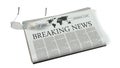 Newspaper with the headline breaking news Royalty Free Stock Photo