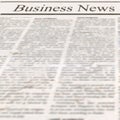 Newspaper with headline Business News and old unreadable text Royalty Free Stock Photo
