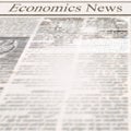 Newspaper with headline Economics News and old unreadable text Royalty Free Stock Photo