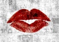 Newspaper with old grunge vintage unreadable paper texture background and woman`s lipstick kiss