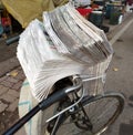 newspaper for sale, distrubing news paper with cycle