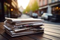 Newspaper stack on a cafe table, an enticing read awaits