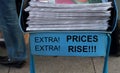 Newspaper stack headline of price increase