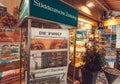 Newspaper stand with frontapage of tabloid Die Welt near street store