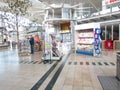 Newspaper stand in shopping precinct.