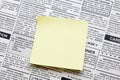 Newspaper and sticky note Royalty Free Stock Photo