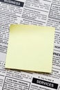 Newspaper and sticky note Royalty Free Stock Photo