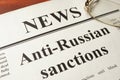 Newspaper with title Anti-Russian sanctions.