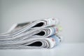 Newspapers with eyeglasses on white background Royalty Free Stock Photo