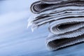 Newspapers folded and stacked on the table