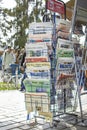 Newspapers on the stand with blur background and copy space for text. International press concept. Royalty Free Stock Photo