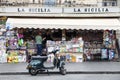 Newsstand, italian square. Catania, Sicily. San Biagio Church and Amphitheater