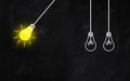 Newton`s cradle with light bulb . Great Idea. Creativity Concept on chalkboard Royalty Free Stock Photo