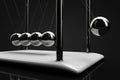 Newton`s pendulum in action. Close-up Royalty Free Stock Photo