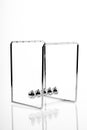 Newtons Cradle balancing balls, business concept Royalty Free Stock Photo