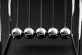 Newtons Cradle balancing balls, business concept Royalty Free Stock Photo