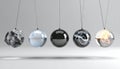 Newtons Cradle with Five Elements of Nature Royalty Free Stock Photo