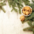 NewYear. Delicious ginger biscuits. Fir branch. Light background Royalty Free Stock Photo