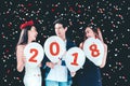 Newyear party ,celebration party group of asian young people holding balloon numbers 2018 happy and funny concept Royalty Free Stock Photo