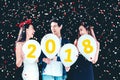 Newyear party ,celebration party group of asian young people holding balloon numbers 2018 happy and funny concept Royalty Free Stock Photo