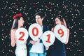 Newyear party ,celebration party group of asian young people holding balloon numbers 2019 happy and funny concept Royalty Free Stock Photo