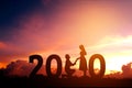 2020 Newyear Silhouette young couple Happy for romantic new year concept