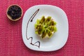 Rice biscuit with cheese and kiwi.