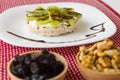 Rice biscuit with cheese and kiwi.