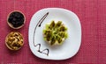 Rice biscuit with cheese and kiwi.