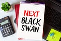 Next black swan symbol. Wooden blocks with words 'Next black swan'. Beautiful grey background Royalty Free Stock Photo