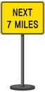 Next 7 miles road sign isolated on white background Royalty Free Stock Photo