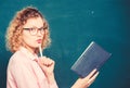 Next school year. Girl prepare for exams. happy student in glasses at blackboard. girl teacher at private lesson. essay Royalty Free Stock Photo