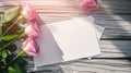 Next to a blank paper with copy-space for your personalized message, a bouquet of pink roses, perfect for a greeting Royalty Free Stock Photo