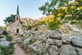 Church of Saint John, surrounded by dramatic rocky mountain scenery at sunset, Kotor,Montenegro