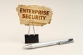 Next to the handle is an office clip with a sign. On the plate is the inscription - Enterprise security