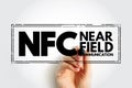 NFC - Near Field Communication acronym, technology concept background Royalty Free Stock Photo