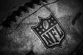 NFL logo on leather ball. Black and White photo Royalty Free Stock Photo