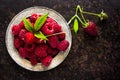 Fresh raspberries in vintage bowl vitamins healthy food vegan ingredients. Selective focus Royalty Free Stock Photo