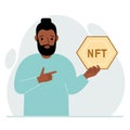 NFT concept. The man is holding nft in his hand. Works of art using non-fungible tokens for auctions, sale and purchase