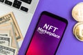 NFT cryptoart marketplace concept. Mobile phone for working with non-fungible token. Future of crypto currency