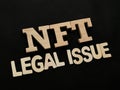 NFT Non Fungible Token legal issue, text words typography written with wooden letter, future digital asset