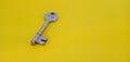 old door lock isolated on yellow background Royalty Free Stock Photo