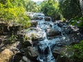 Ngao Waterfall, Beautiful Scenic Waterfall Surrounded by Various of Trees in The Forest in National Park of Ranong Royalty Free Stock Photo