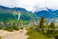 Traditional buddhist prayer flags over foggy mountain background in Ngawal, Nepal