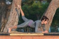 girl performs an exercise plank. exercise in the morning