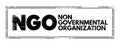 NGO - Non-Governmental Organization is an organization that generally is formed independent from government, acronym text concept