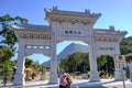 Ngong Ping Entrance gate at Lantau Island, People visit the Tian Tan or the Big Buddha located at Po Lin Monastery, landmark and Royalty Free Stock Photo