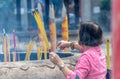 Ngong Ping, Hong Kong - Worshiper outside the Po Lin Monastery Royalty Free Stock Photo