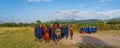 Group of Massai people participating a traditional dance with high jumps